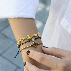 VEVA - Mini gold initial bracelet on mother of pearl