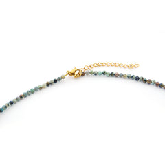 AURA - collar dorado piedras turquesas