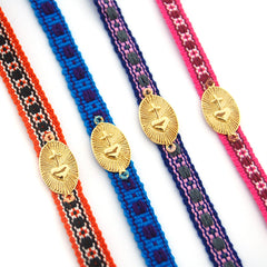 DETENTE DOR Artesano - pulsera tejida con medalla dorada 18x22mm. Edición especial
