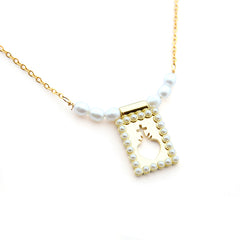 DETENTE DOR PERLAS - collar medalla dorada con perlas