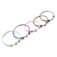 PACK de 5 pulseras pastel con cruz redonda