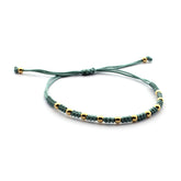 ADA DOR - pulsera bolitas doradas