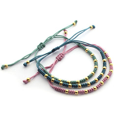 ADA DOR - pulsera bolitas doradas