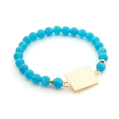 DETENTE DOR - pulsera personalizable dorada piedras azules